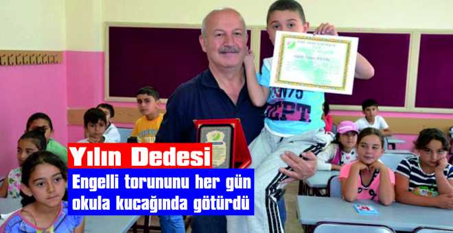 Engelli torununu her gün okula kucağında götürdü 