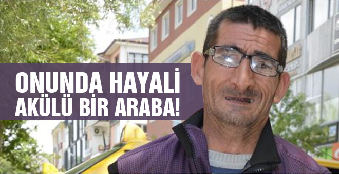 Onunda hayali akülü bir araba!