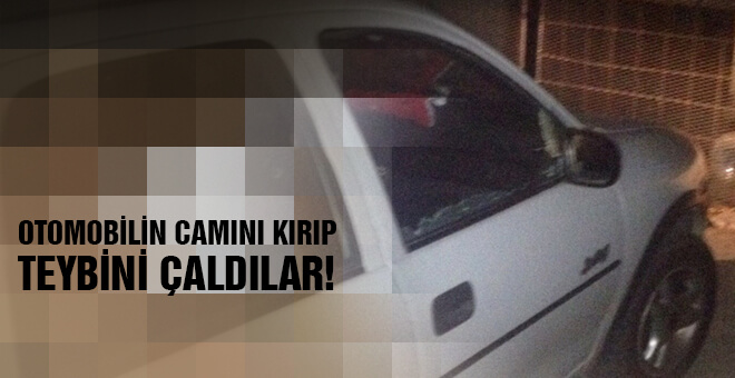 Otomobilin camını kırıp teybini çaldılar